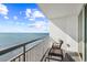 Private balcony featuring outdoor seating and sweeping ocean views, perfect for relaxing at 107 S Ocean Blvd. # 1402, Myrtle Beach, SC 29577
