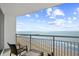 Balcony with chairs offering expansive ocean views and overlooks the sandy beach at 107 S Ocean Blvd. # 1402, Myrtle Beach, SC 29577