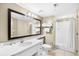 Lovely full bathroom has vanity, sink, mirror, lighting, and commode at 107 S Ocean Blvd. # 1402, Myrtle Beach, SC 29577