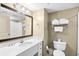Clean, efficient bathroom equipped with a sink, toilet, and shower/tub combination for guests at 107 S Ocean Blvd. # 1402, Myrtle Beach, SC 29577