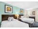 This roomy bedroom provides sleeping for two in a guest suite setting at 107 S Ocean Blvd. # 1402, Myrtle Beach, SC 29577