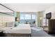 This Main Bedroom is beautiful and features a balcony with ocean views at 107 S Ocean Blvd. # 1402, Myrtle Beach, SC 29577
