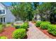 Scenic Dock Access with landscaped walkway, lush greenery, and community sign at 111 Rose Water Loop # 111, Myrtle Beach, SC 29588