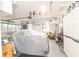 Spacious garage with epoxy flooring, storage shelving, and a covered vehicle at 111 Rose Water Loop # 111, Myrtle Beach, SC 29588