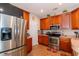 Kitchen with stainless steel appliances and wooden cabinetry at 111 Rose Water Loop # 111, Myrtle Beach, SC 29588
