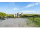 Scenic beach access with wooden walkway, enhanced by lush dune vegetation and a bright, sunny sky at 113A 9Th Ave. S, Surfside Beach, SC 29575
