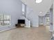 Bright, open living space with high ceilings, tile floors, and a staircase at 113A 9Th Ave. S, Surfside Beach, SC 29575