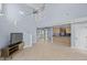 Open-concept living area with stairs, tile floors, and access to the kitchen at 113A 9Th Ave. S, Surfside Beach, SC 29575