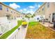 Fenced backyard features a patio area and space for outdoor seating perfect for enjoying a summer BBQ at 1147 Fairway Ln. # 1147, Conway, SC 29526