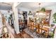 Spacious dining room with hardwood floors, elegant furniture, and ample natural light at 1147 Fairway Ln. # 1147, Conway, SC 29526