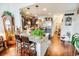 Stylish kitchen with granite countertops, bar seating, and stainless steel appliances for a functional and elegant space at 1147 Fairway Ln. # 1147, Conway, SC 29526