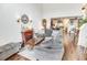 Inviting living room featuring a cozy fireplace, high ceilings, and lots of natural light from large windows at 1147 Fairway Ln. # 1147, Conway, SC 29526