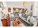 Spacious living room with a large sectional sofa, high ceilings, and elegant decor create a cozy atmosphere at 1147 Fairway Ln. # 1147, Conway, SC 29526