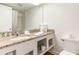 Bright bathroom featuring granite countertops, fresh towels and toiletries, and a shower with tub at 1205 S Ocean Blvd. # 20609, Myrtle Beach, SC 29577