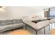 Bright bedroom features two beds, a sofa, and a view of the ocean at 1205 S Ocean Blvd. # 20609, Myrtle Beach, SC 29577