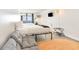 Bright bedroom features two beds, a sofa, TV and a view of the beach at 1205 S Ocean Blvd. # 20609, Myrtle Beach, SC 29577