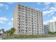 Exterior of building with many balconies overlooking beach access and ocean at 1205 S Ocean Blvd. # 20609, Myrtle Beach, SC 29577