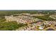Aerial view showcases a desirable neighborhood surrounded by trees and scenic ponds at 125 Mountain Ash Ln., Myrtle Beach, SC 29579