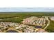 Overhead view features a neighborhood with a community pool, scenic ponds, and lush greenery at 125 Mountain Ash Ln., Myrtle Beach, SC 29579
