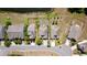 Aerial view of home with well-manicured lawns, private driveways, and neighborhood street layout at 125 Mountain Ash Ln., Myrtle Beach, SC 29579