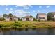 Water view of the homes backyard showcasing a serene pond enhancing the property's appeal and tranquility at 125 Mountain Ash Ln., Myrtle Beach, SC 29579