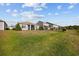Backyard of a home featuring a covered patio and a well-maintained lawn in a desirable neighborhood at 125 Mountain Ash Ln., Myrtle Beach, SC 29579