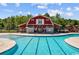 Community pool and barn-themed clubhouse with playground in a Gathering-friendly neighborhood at 125 Mountain Ash Ln., Myrtle Beach, SC 29579