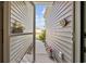 Outdoor entrance featuring a walkway to the front door and meticulously kept flower beds at 125 Mountain Ash Ln., Myrtle Beach, SC 29579