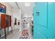 Bright foyer featuring a colorful door, hardwood floors, and stylish accents at 125 Mountain Ash Ln., Myrtle Beach, SC 29579