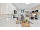 Beautiful kitchen with stainless steel appliances, tiled backsplash, white cabinets, and a convenient island at 125 Mountain Ash Ln., Myrtle Beach, SC 29579