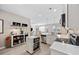 Bright kitchen with stainless steel appliances, light countertops, and an open layout at 125 Mountain Ash Ln., Myrtle Beach, SC 29579