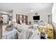 Inviting living room with a large sectional sofa, decorative rug, and built-in shelving at 125 Mountain Ash Ln., Myrtle Beach, SC 29579