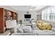 Comfortable living room offering stylish furniture, modern fireplace, and a neutral color palette at 125 Mountain Ash Ln., Myrtle Beach, SC 29579