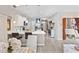 Open-concept living area with barstool seating, stainless appliances and modern decor at 125 Mountain Ash Ln., Myrtle Beach, SC 29579