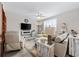 Cozy living room featuring a ceiling fan, large screen tv, and comfortable furniture at 125 Mountain Ash Ln., Myrtle Beach, SC 29579