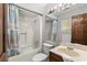 Bathroom with a tub and shower combination, a vanity sink and good light at 1314 Holly Dr., North Myrtle Beach, SC 29582