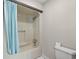 Functional bathroom features a standard tub/shower combination, and a toilet with a side table for added convenience at 1314 Holly Dr., North Myrtle Beach, SC 29582