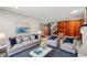 Inviting living room with gray sofas, blue accents, and a cozy atmosphere at 1314 Holly Dr., North Myrtle Beach, SC 29582