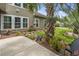 Charming backyard with a patio, lush lawn, and beautiful landscaping providing an outdoor oasis at 1416 Castleberry Pl., Myrtle Beach, SC 29588