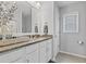 Bright bathroom featuring a white vanity with granite countertops and brushed silver fixtures at 1416 Castleberry Pl., Myrtle Beach, SC 29588