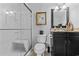 Bathroom featuring glass shower, toilet and dark wood vanity with framed mirror at 1416 Castleberry Pl., Myrtle Beach, SC 29588