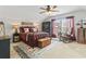 Comfortable bedroom with vaulted ceiling, ceiling fan and rustic, outdoorsy decor at 1416 Castleberry Pl., Myrtle Beach, SC 29588