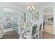 Charming dining room with arched entryways, stylish seating, and elegant decor at 1416 Castleberry Pl., Myrtle Beach, SC 29588