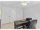 Office space with desk, chair, and storage cabinets near a closet with white doors at 1416 Castleberry Pl., Myrtle Beach, SC 29588