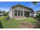 Landscaped backyard with patio and lawn space, perfect for outdoor living and entertaining at 1434 Chanson Ct., Little River, SC 29566