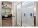 Bright bathroom with a glass-enclosed shower and a view into an adjacent bedroom at 1434 Chanson Ct., Little River, SC 29566