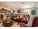 Spacious living room flows into the kitchen with modern lighting and hardwood floors at 1434 Chanson Ct., Little River, SC 29566