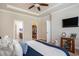Spacious bedroom boasts a ceiling detail, with an en-suite bathroom and closet at 1434 Chanson Ct., Little River, SC 29566
