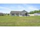 Beautifully maintained backyard with a patio, outdoor dining, and a well-kept lawn, ideal for outdoor activities and relaxation at 1536 Abberbury Dr., Conway, SC 29527