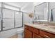Clean bathroom showcasing a shower and a vanity with a stone countertop at 1536 Abberbury Dr., Conway, SC 29527
